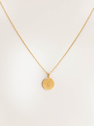 Necklace with a round medallion