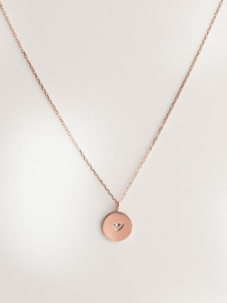 Necklace with a round medallion